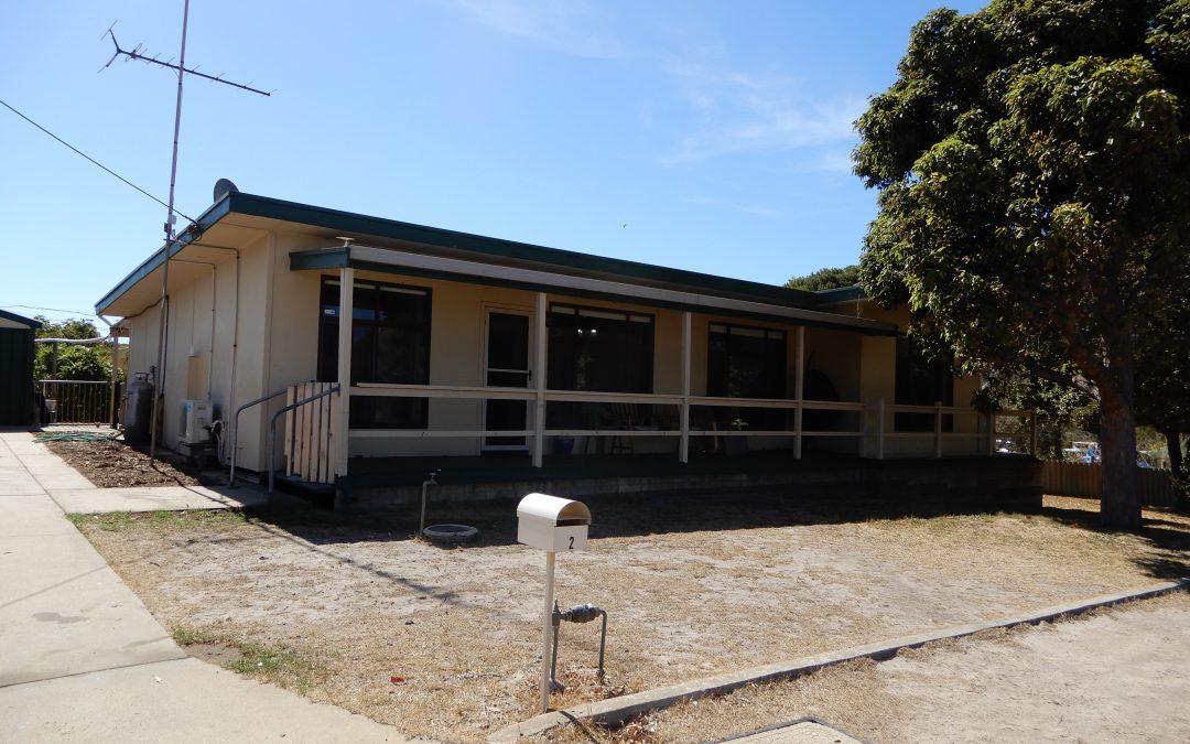 One street back from the beach and two sheds!
